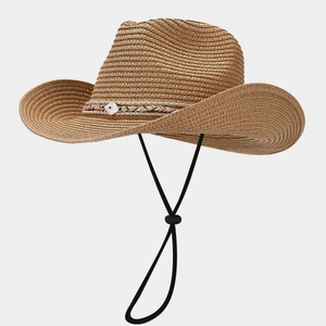 Detailed straw weave texture and white shuttle accent on a classic cowboy sun hat