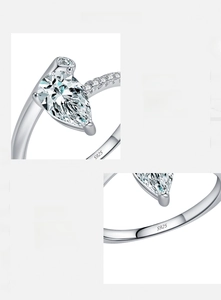 Detailed macro view of S925 sterling silver ring with hand-set teardrop 5A cubic zirconia