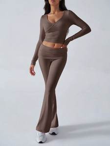 Deep brown two-piece slim fit knit sports set with V-neck long sleeve top and flared trousers