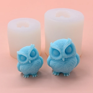 Macro detail of owl-shaped silicone molds with feather textures for 3D DIY craft projects