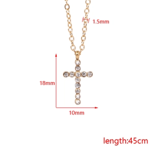 Gold stainless steel cross necklace with crystal pavé and 45cm length dimensions