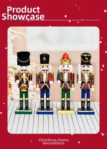 Close-up of four handmade wooden nutcrackers in red, green and blue holiday outfits