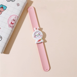 Close-up of pink silicone slap watch with a white cartoon rabbit dial on a beige background