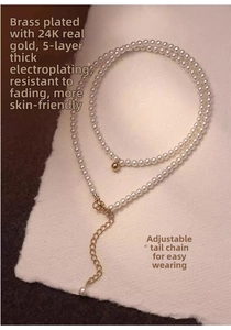 Detail of double-layer freshwater pearl necklace with 14K gold-plated adjustable chain