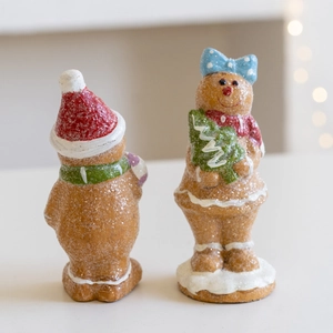 Resin gingerbread man Christmas tree ornaments with glitter finish on snow base