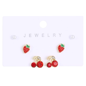 Detail of cute alloy fruit stud earrings set featuring red strawberry and cherry designs