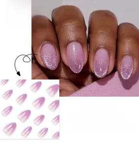 Detail of short almond press-on nails with purple gradient and silver glitter powder