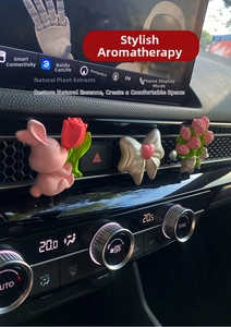 Car vent clips featuring a pink bunny, pearl bow, and tulip bouquet aromatherapy stones