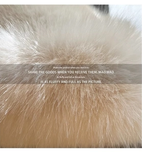 Macro shot of fluffy light beige faux mink fur showing soft texture and high-density pile