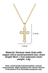 Detail of gold hollow cross pendant with micro-pave crystals on stainless steel chain