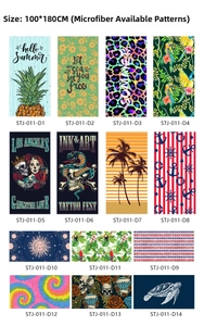 Collection of 100x180cm microfiber beach towels with various tropical and geometric prints