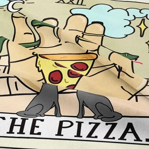 Detail shot of bohemian tapestry fabric showing woven texture and The Pizza tarot design