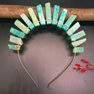 Detail of teal crystal raw stones hand-wired on a bohemian bridal headband