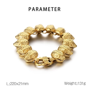 Detail view of 21mm wide punk snake head link bracelet in polished golden stainless steel