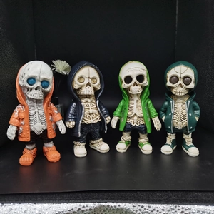 Detailed set of four skeleton figures in colorful hoodies for street style home decor