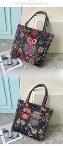Detail of colorful ethnic woven owl tapestry tote bag with embroidery texture