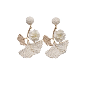 Bohemian raffia flower and ginkgo leaf drop earrings with white fabric floral detail