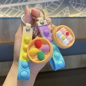 Porte-clés avec pendentif dim sum vapeur et bracelet en silicone pop-it pour sac à main