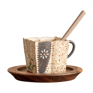 Ceramic espresso cup with wooden saucer and spoon featuring hand-painted daisy and wood grain