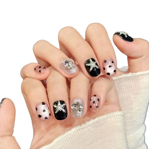 Pink and black leopard star press-on nails with glitter cat eye finish and 3D rhinestones