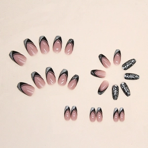 French tip press-on nails with black leopard print and silver glitter in ballerina shape