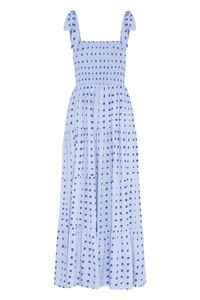 Detail of blue plaid maxi dress showing adjustable shoulder ties and smocked chest bodice