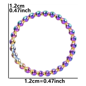 Macro shot of a 1.2cm rainbow beaded stainless steel ring connector with size labels