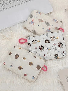 Quilted cartoon pouches featuring elephant and bear patterns on a plush surface