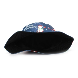 Detail of navy bucket hat with Merry Christmas embroidery and festive holiday print