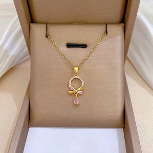 Titanium steel jewelry set with sparkling pavé ring and pink teardrop pendant in gift box