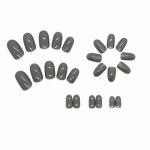 Glossy dark grey press-on nails in oval shape, set of 24 pieces on white background