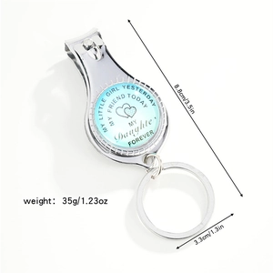 Silver metal nail clipper keychain with My Little Girl Yesterday engraved glass dome