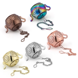 Five teapot-shaped stainless steel tea strainers in rainbow, bronze, gold, and silver finishes