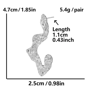 Detail view of silver irregular lava texture earrings with dimensions and weight data