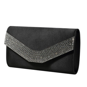 Close-up of elegant black satin evening clutch featuring a sparkling V-shaped rhinestone flap