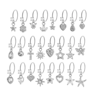 Set of silver piercing rings featuring heart and star charms with white zircon inlay