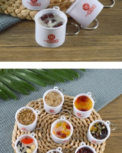 Detailed close-up of mini realistic congee bowl keychains with assorted cereal textures