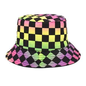 Detail of black reversible bucket hat featuring a rainbow gradient checkered pattern