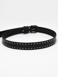 Detail view of a black Y2K punk belt with double-row silver metal rivets and a buckle