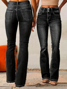 Detail view of charcoal grey flare jeans showing front and back stretch denim texture