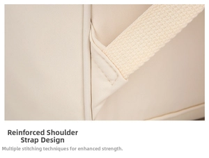 Detail of bartack reinforced stitching on a cream diaper bag for heavy duty support