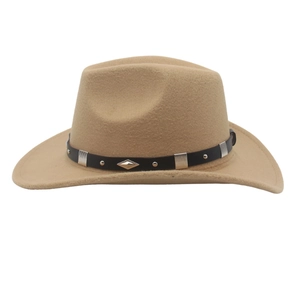 Close-up of western cowboy hat with studded leather band and polished silver metal accents