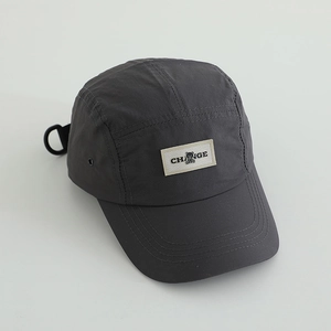 Detail of dark grey quick-dry five-panel camping cap with bear patch and D-ring buckle