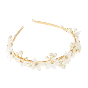 Elegant floral headband with white petals, pearls and crystals on a gold metal frame