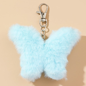 Light blue faux fur butterfly keychain with silver metal clip and fluffy texture