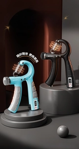 Detail view of the 5-60kg adjustable hand gripper with a mechanical counter and non-slip grip