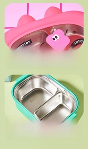 Detail view of pink and green 304 stainless steel bento box with divided compartments