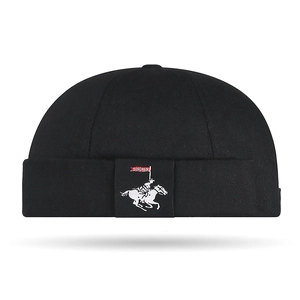 Classic black Miki Hat with equestrian embroidery patch in a retro brimless style