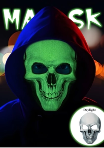 Luminous Halloween skull mask showing fluorescent green glow versus daylight look