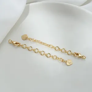 Detail of 14K gold filled extension chains with heart charms and lobster clasps